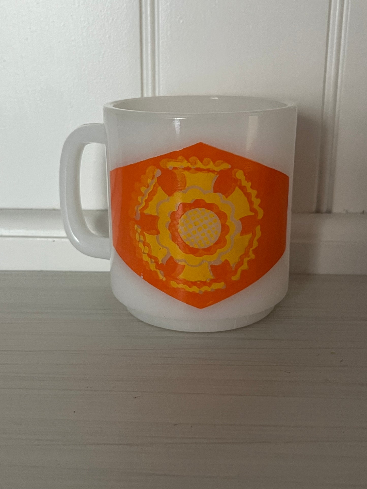 Vintage Fire-King Milk Glass Mug – Orange & Yellow Geometric Flower (c. 1970s, Anchor Hocking USA)