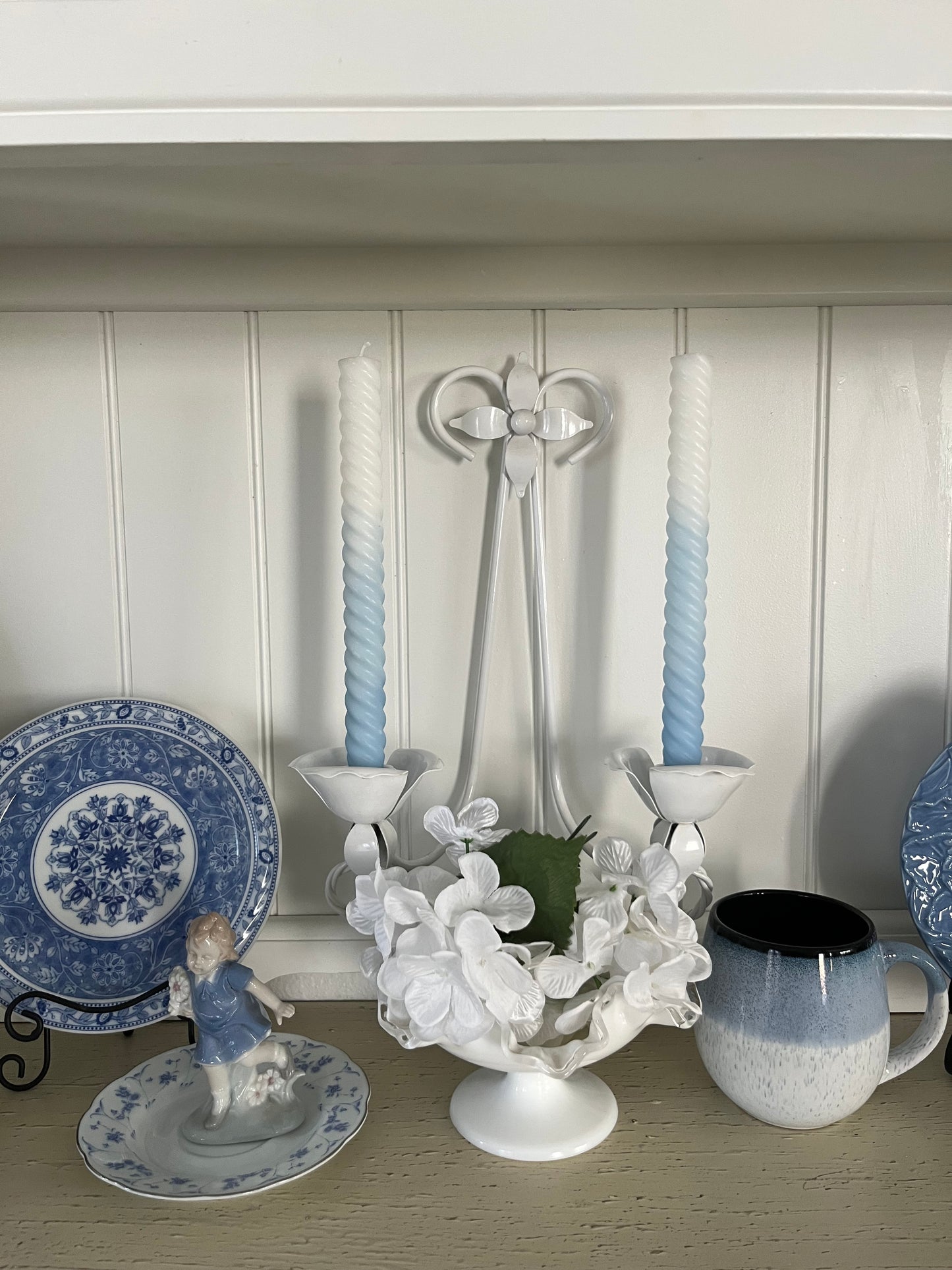Vintage C.1980’s White Tole Double Wall Candle Sconce with tulip-shaped candle cups, and a four-pointed floral petal at the top