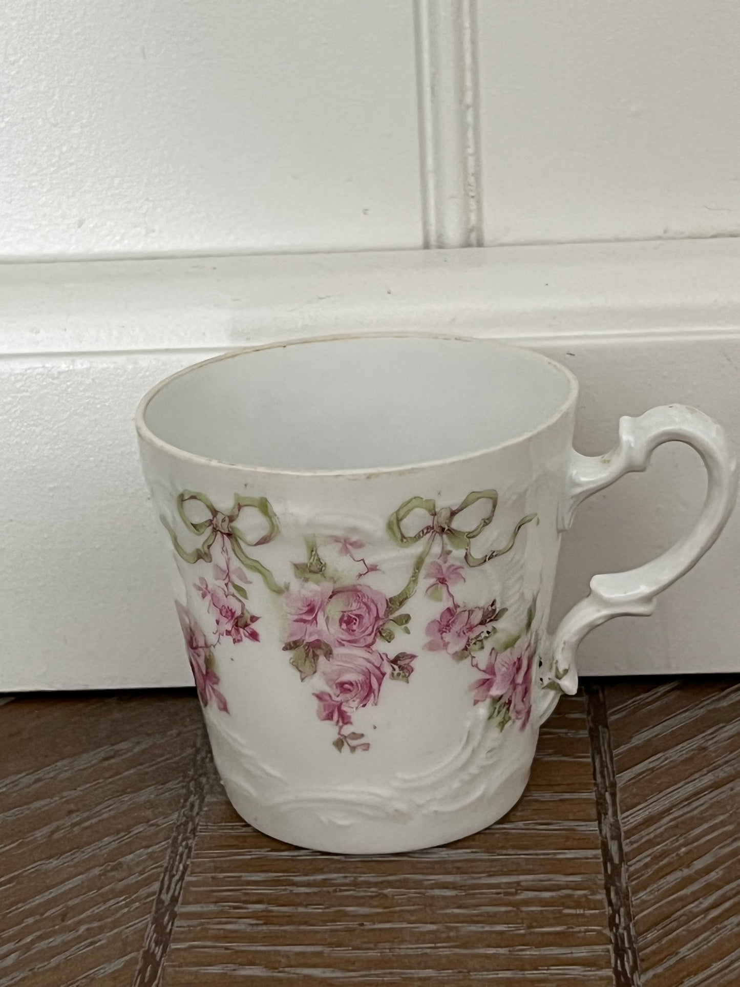 Antique German Porcelain Demitasse Cup – Pink Rose & Ribbon Garland, c. 1890–1910