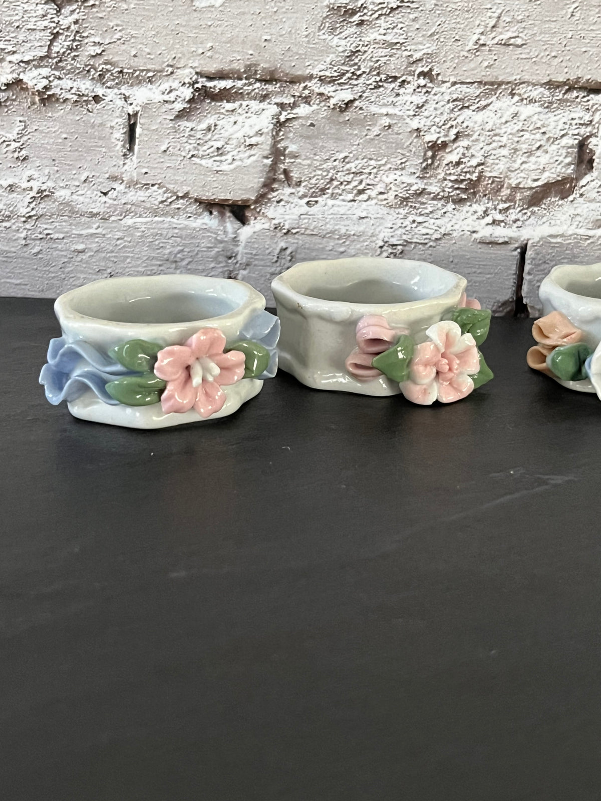 Vintage 1980s Glazed Porcelain Sculpted Floral Napkin Rings – Set of 6 Pastel 3D Flowers & Ribbons