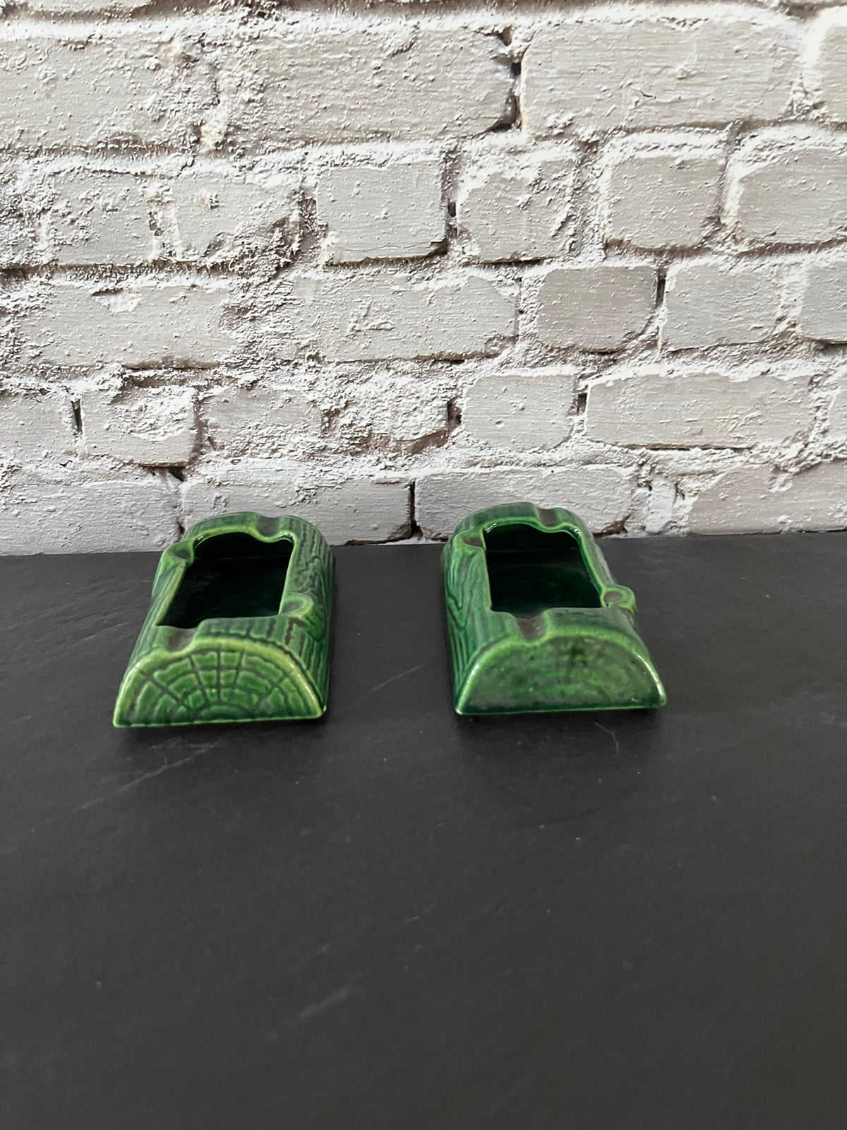 Pair of 1950s Treasure Craft Green Ceramic Log Ashtrays – Forest Woodgrain Glaze Set of 2