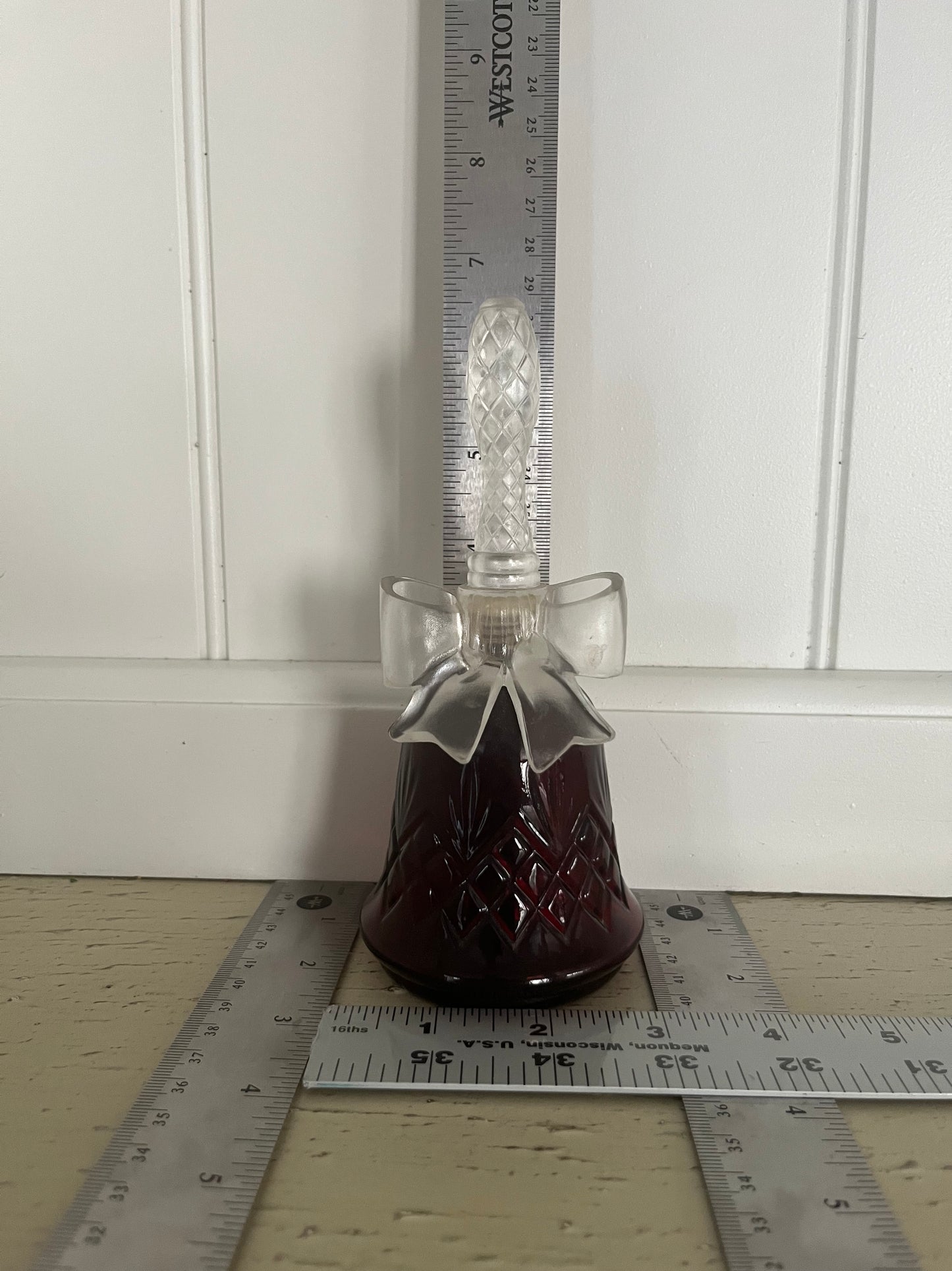 1970s vintage Avon Crystalsong Sonnet cologne Empty Ruby Red bottle in a bell shape with a clear  bow stopper