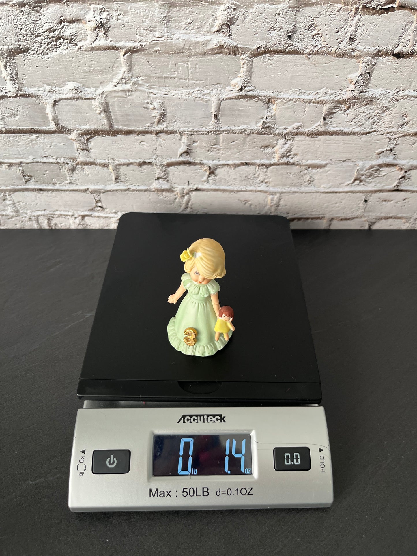 Vintage Enesco Growing Up Birthday Girls Age 3 Figurine – Bisque Porcelain Touched Up/Repaired Blonde Girl with Doll Pastel Green Dress (1980s–1990s)