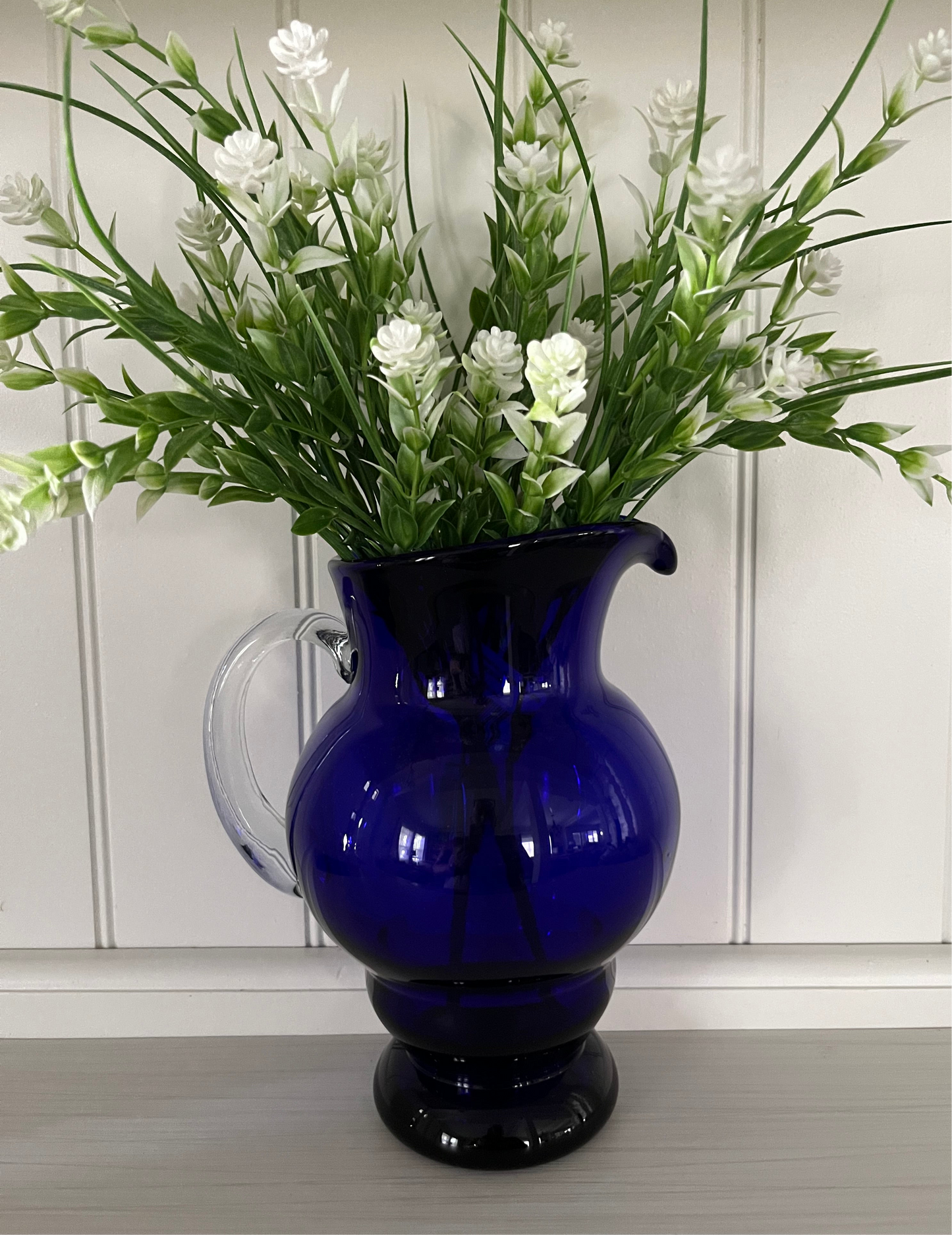 Vintage 1980s Cobalt Blue Glass Water Pitcher with Clear Handle – Hand-Blown Style