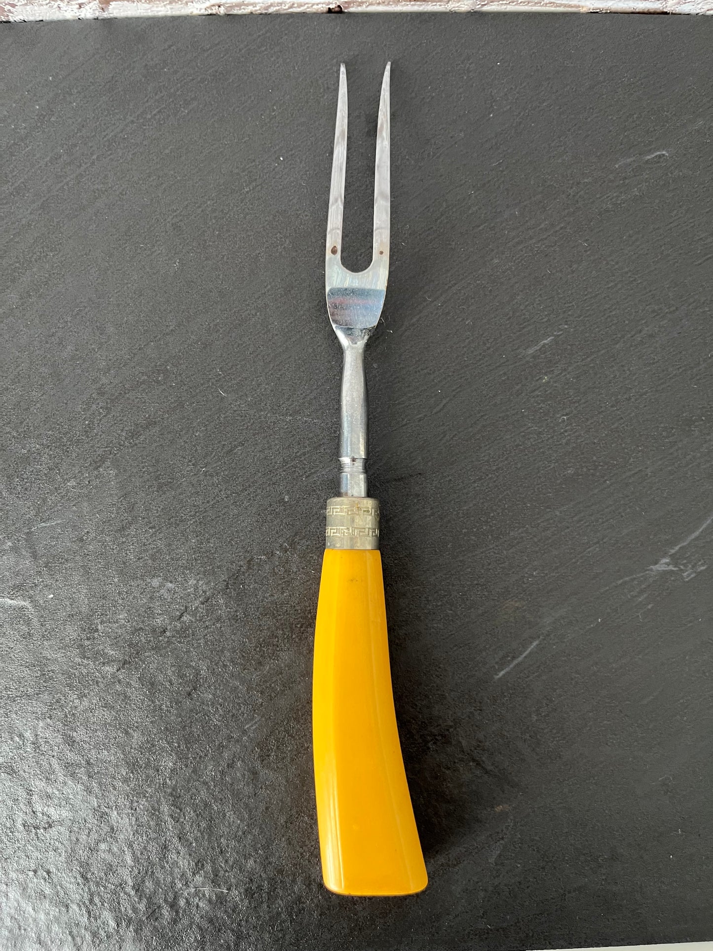 Vintage Mid-Century Yellow Handle Carving Fork with Greek Key Accent | Retro Atomic Kitchen Serving Utensil