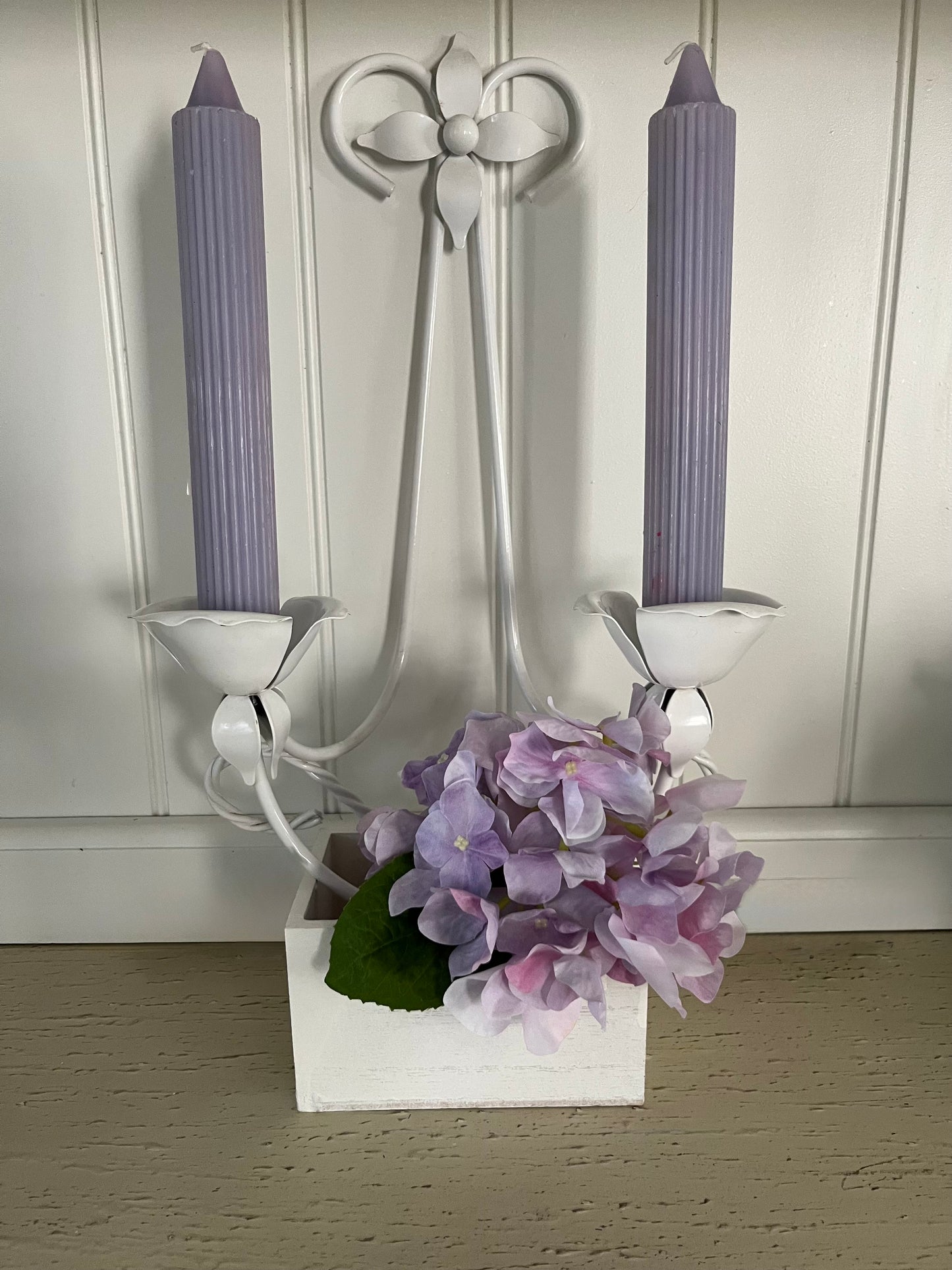 Vintage C.1980’s White Tole Double Wall Candle Sconce with tulip-shaped candle cups, and a four-pointed floral petal at the top