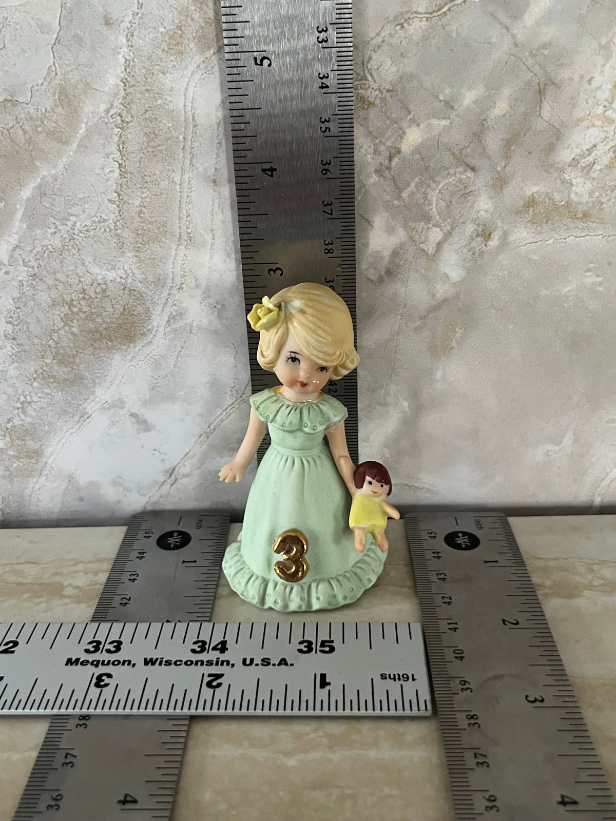 Vintage Enesco Growing Up Birthday Girls Age 3 Figurine – Bisque Porcelain Touched Up/Repaired Blonde Girl with Doll Pastel Green Dress (1980s–1990s)
