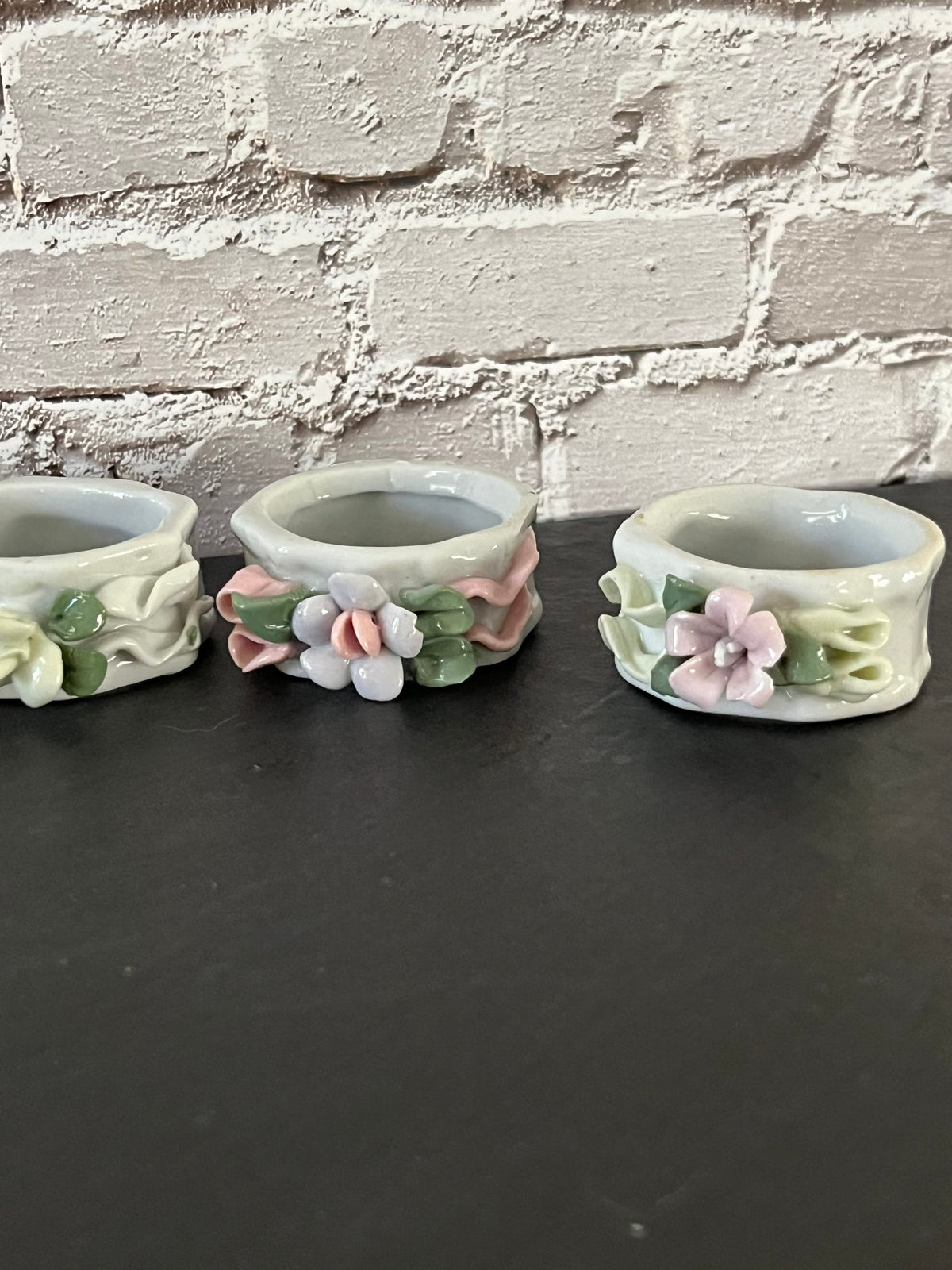 Vintage 1980s Glazed Porcelain Sculpted Floral Napkin Rings – Set of 6 Pastel 3D Flowers & Ribbons