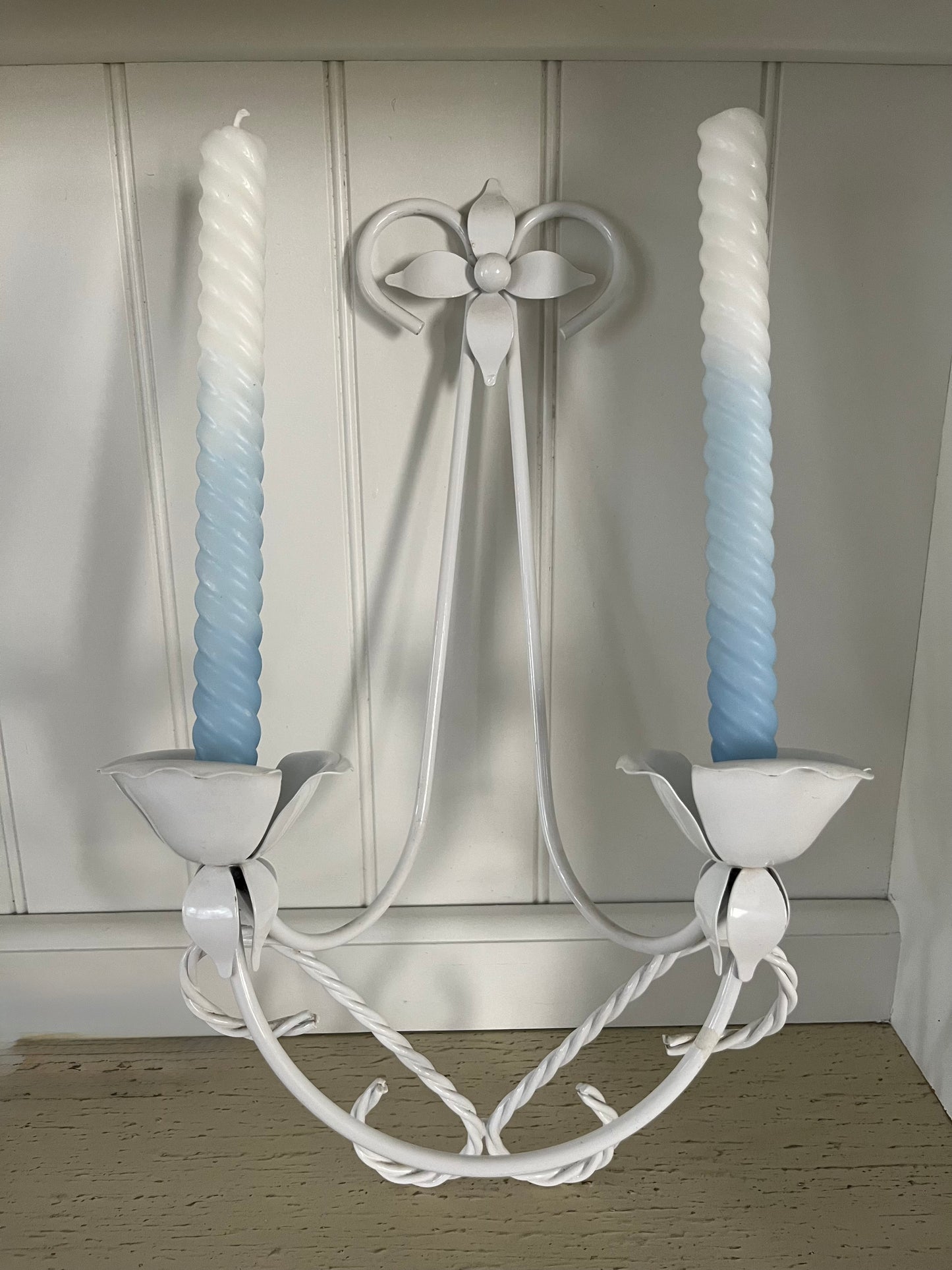 Vintage C.1980’s White Tole Double Wall Candle Sconce with tulip-shaped candle cups, and a four-pointed floral petal at the top