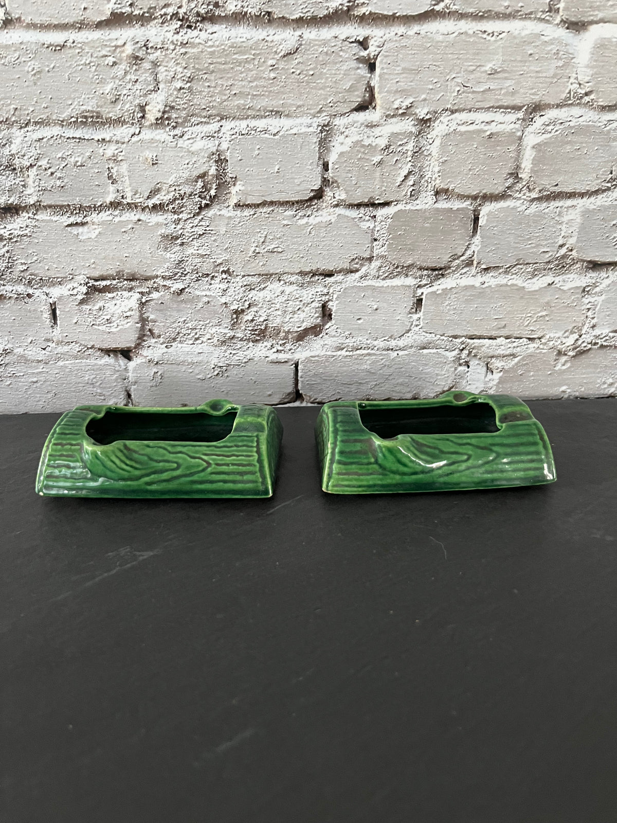Pair of 1950s Treasure Craft Green Ceramic Log Ashtrays – Forest Woodgrain Glaze Set of 2