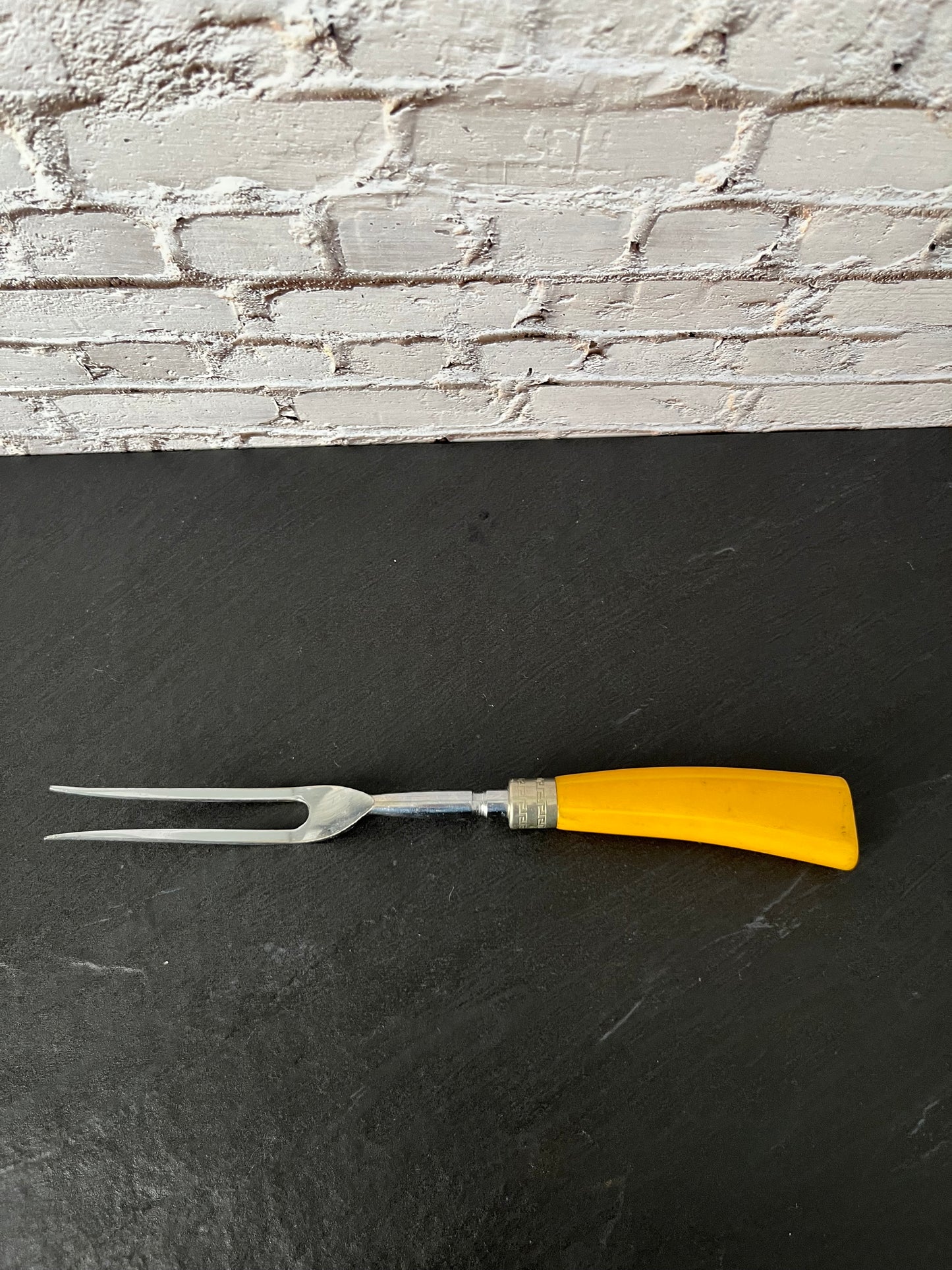 Vintage Mid-Century Yellow Handle Carving Fork with Greek Key Accent | Retro Atomic Kitchen Serving Utensil