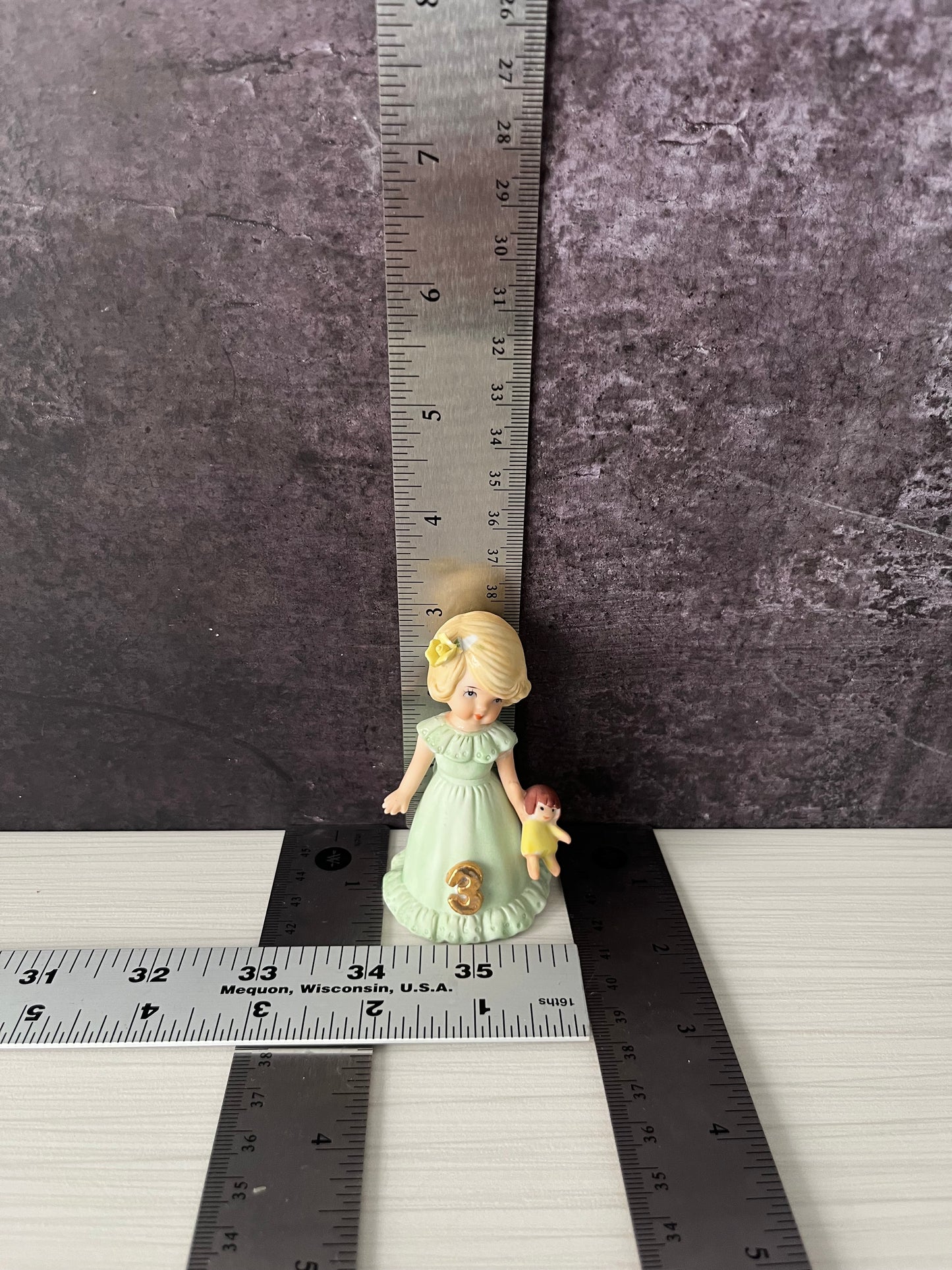 Vintage Enesco Growing Up Birthday Girls Age 3 Figurine – Bisque Porcelain Touched Up/Repaired Blonde Girl with Doll Pastel Green Dress (1980s–1990s)