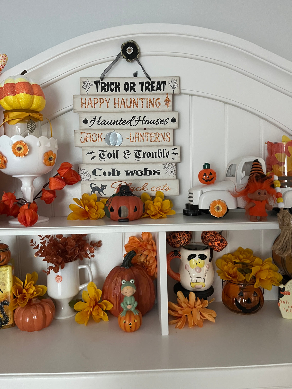 White Pedestal Mug with Orange Moon Face | Curated Shelf & Trinket Display Décor