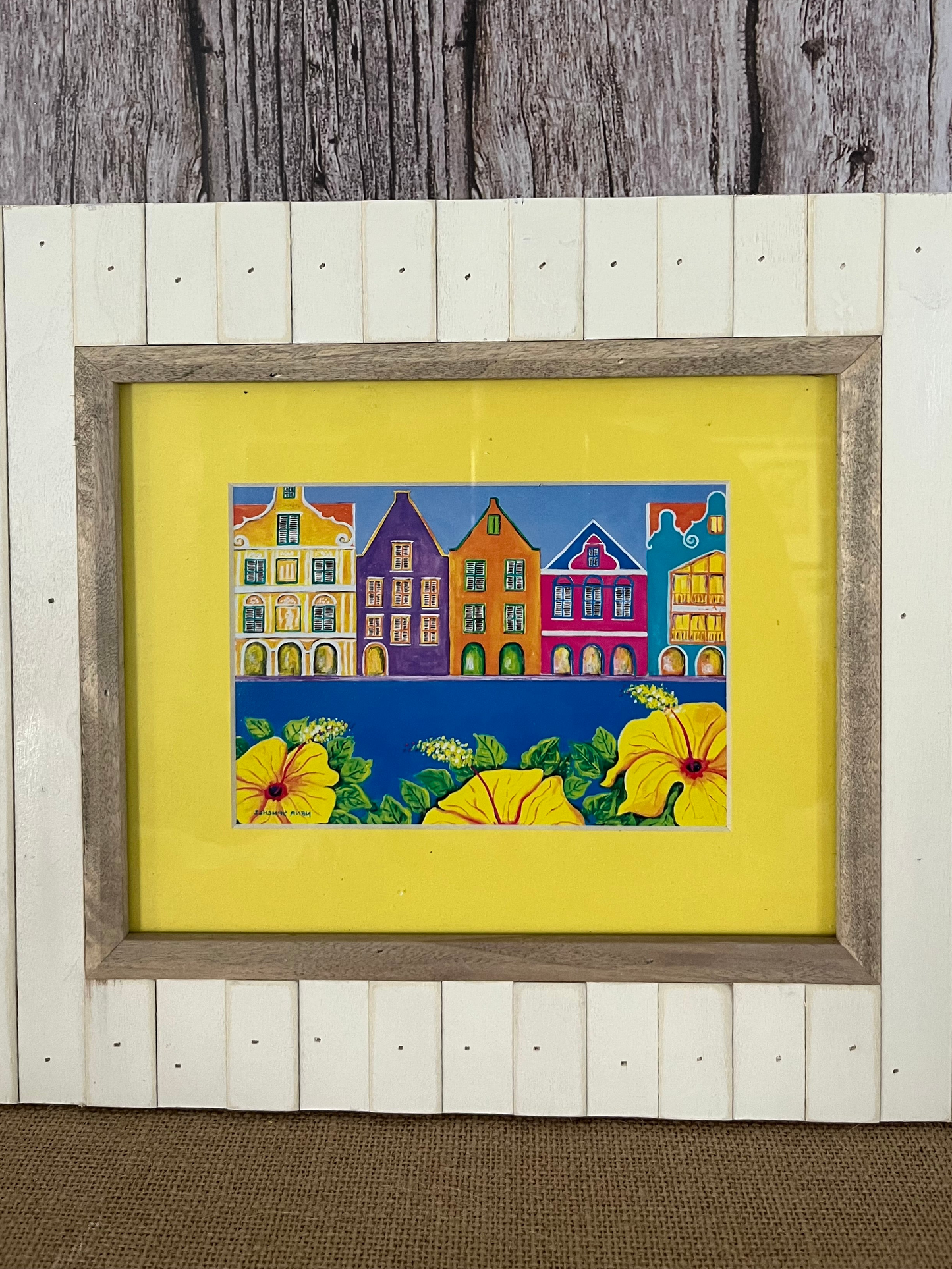 Nena Sanchez “Waterkant Curaçao” Print Framed Wall Art - Vibrant Caribbean Houses & Hibiscus 14” x 12”