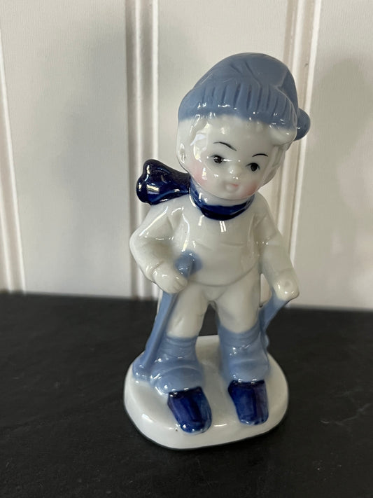 Vintage Blue and White Porcelain Little Boy Skiing Figurine - Charming Collectible from Lego Japan