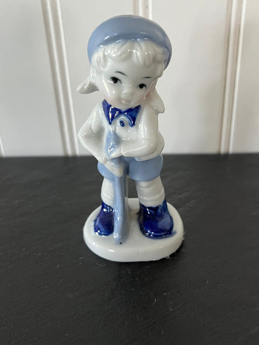 Vintage Blue and White Porcelain Little Girl Golfing Figurine - Charming Collectible from Lego Japan